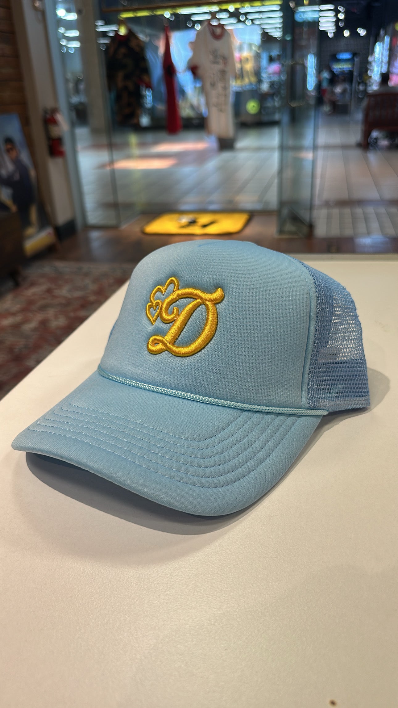 Trucker hat (baby blue/yellow)